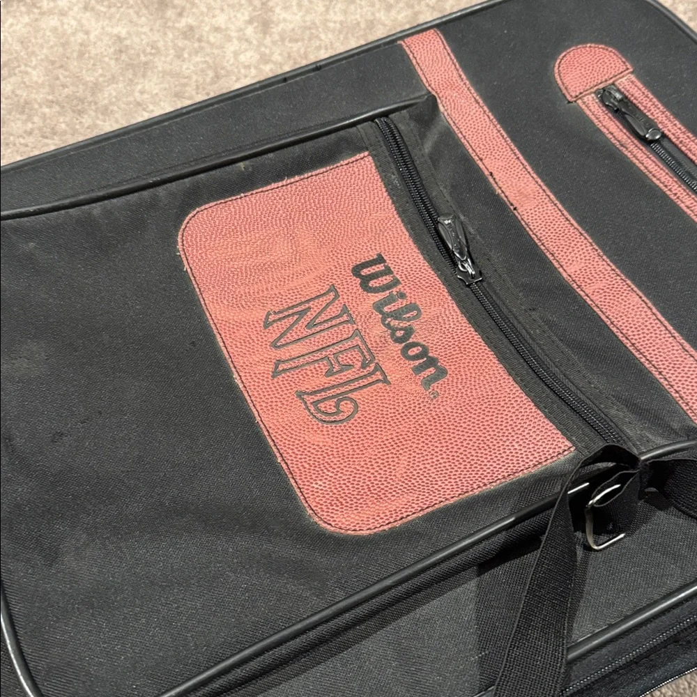 Wilson Black Football Roller Suitcase